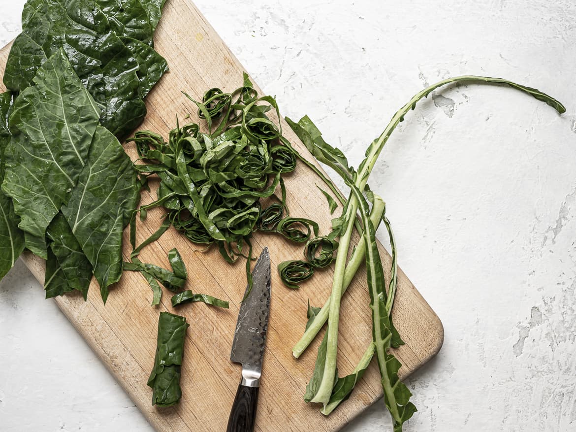 Stemming and chopping collard greens