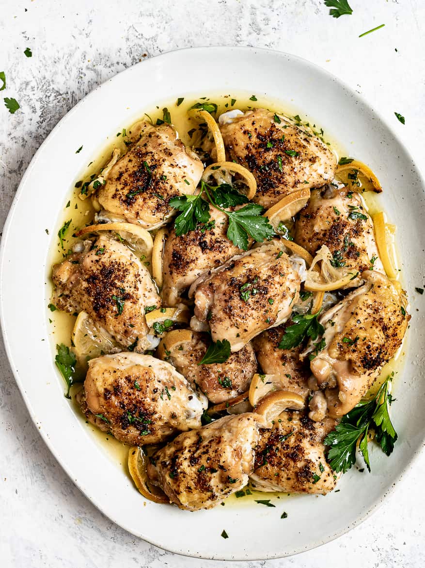 Baked Lemon Chicken Thighs served on platter