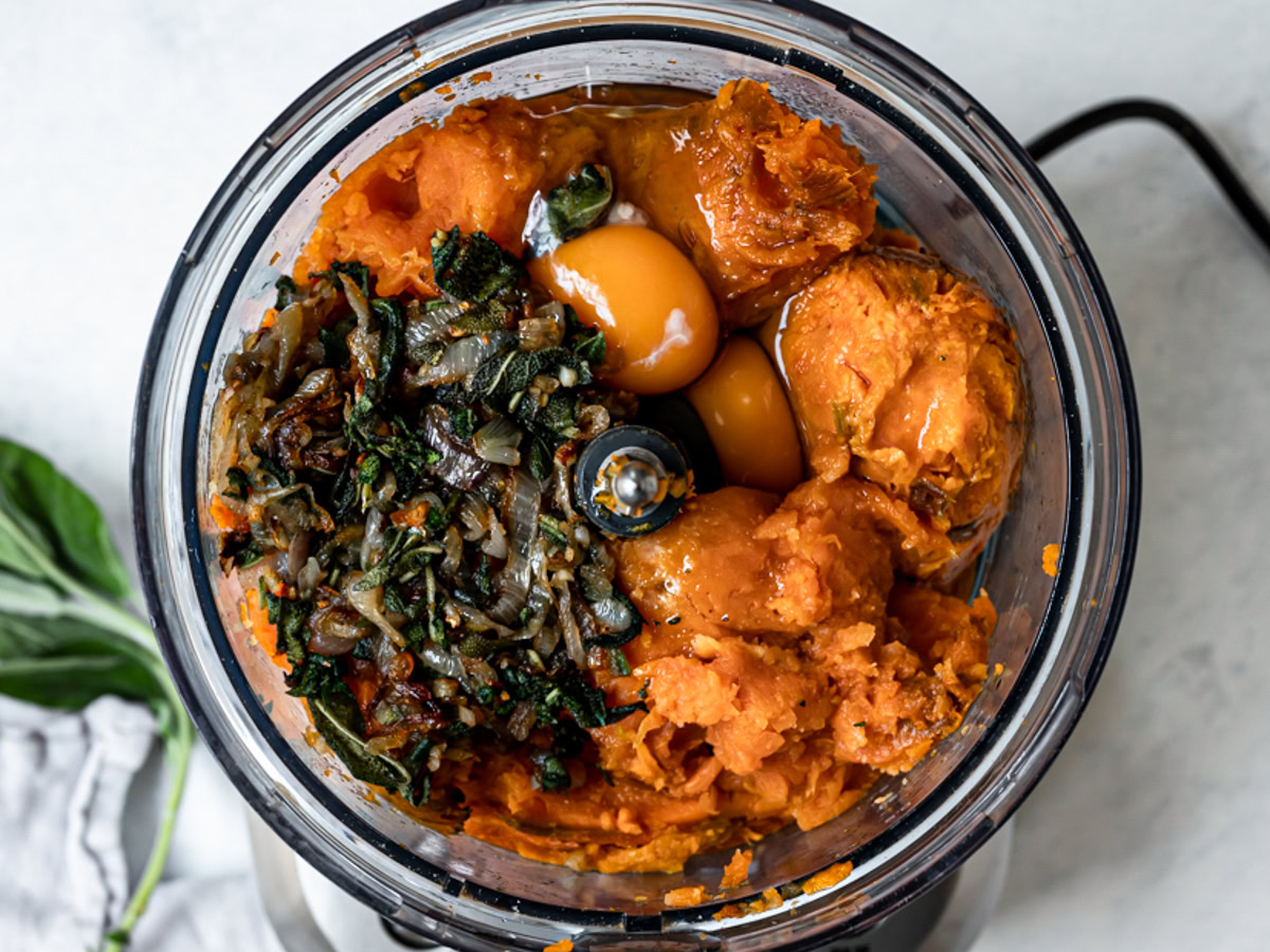 Pureeing sweet potatoes in food processor