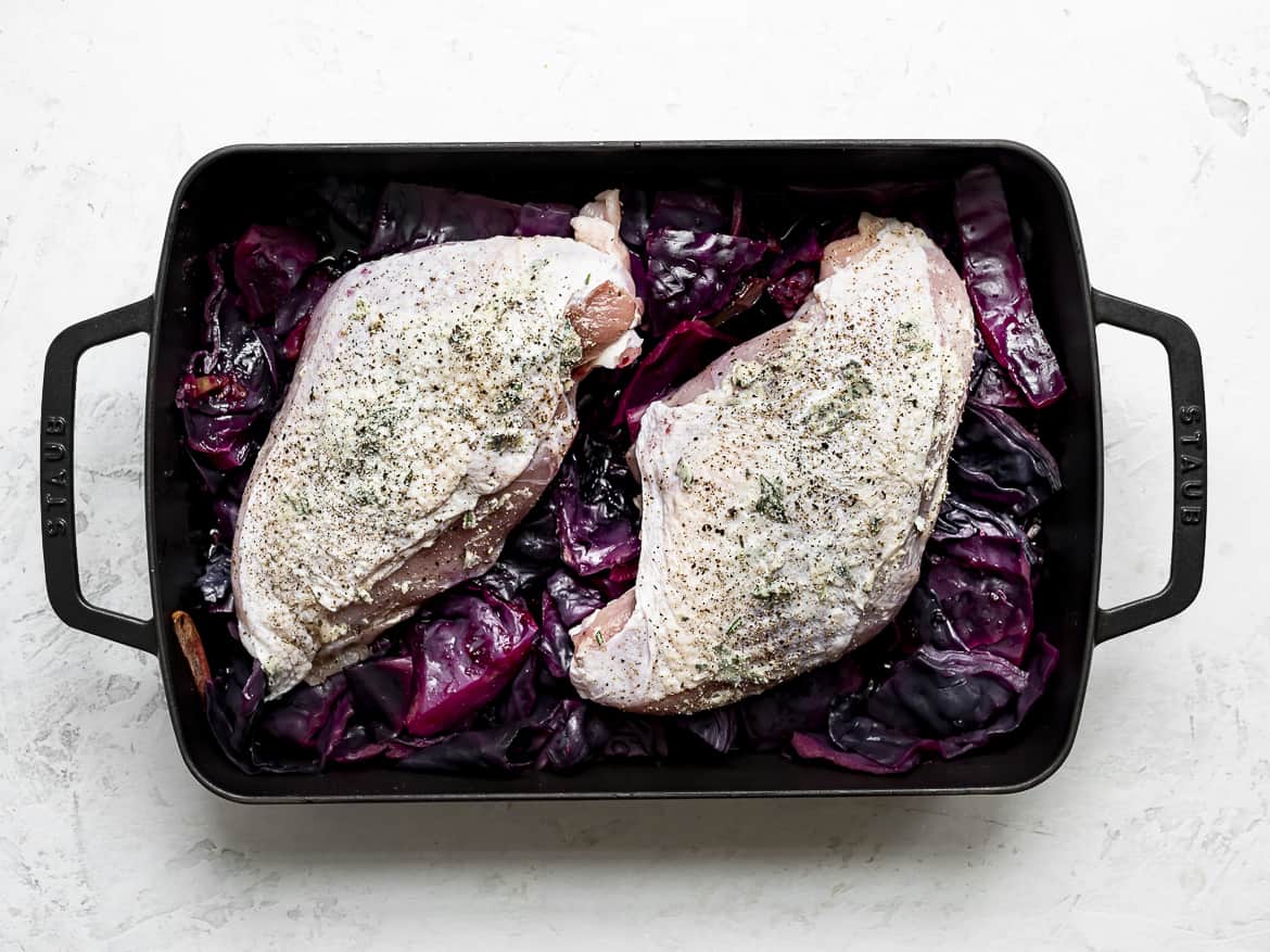 Turkey breast on top of braised cabbage before going in the oven