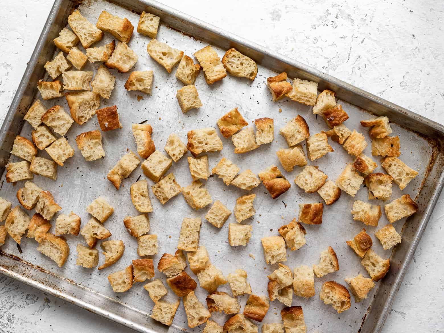 focaccia croutons on baking sheet