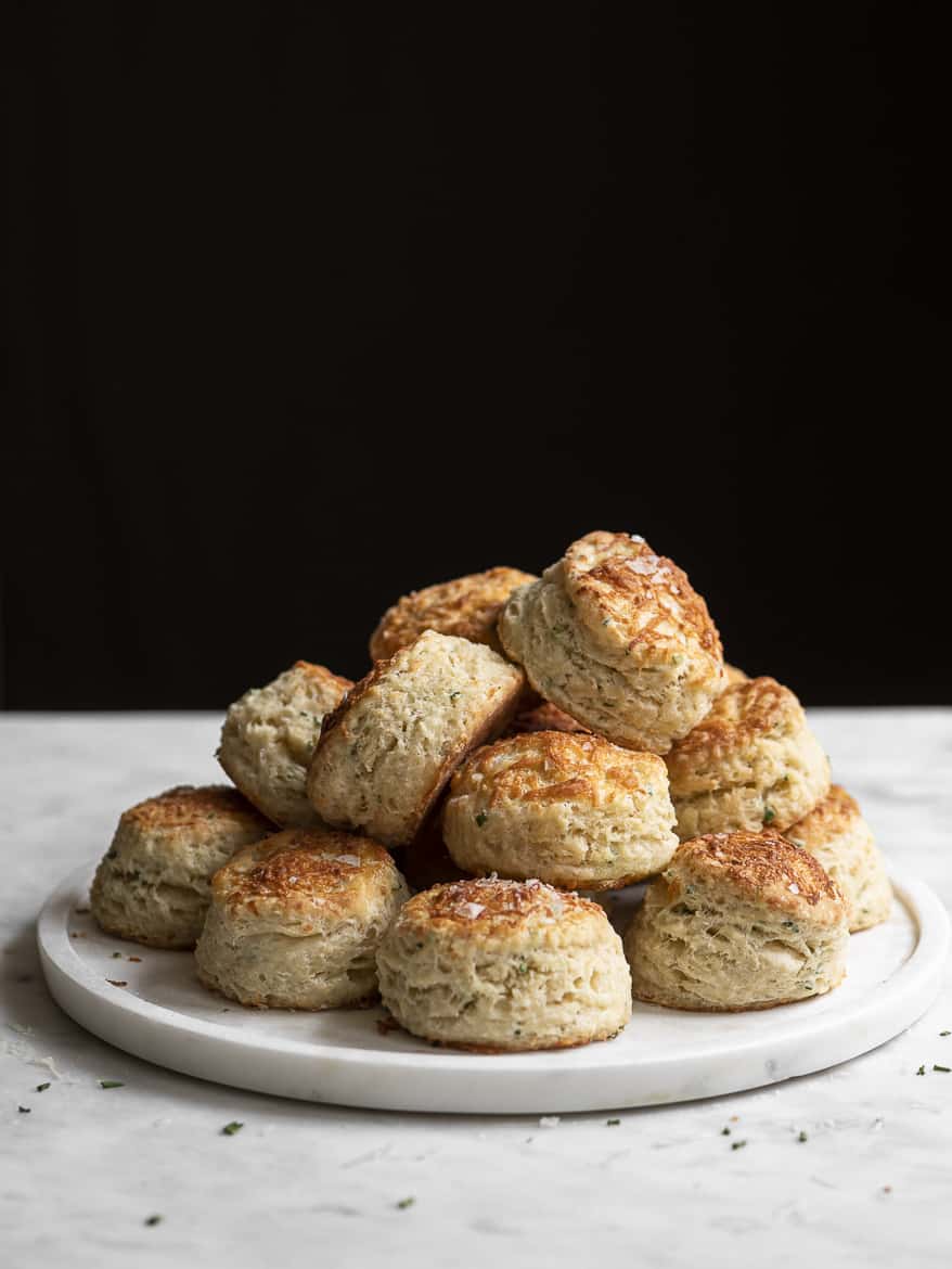 Buttermilk and manchego scones piled on plate