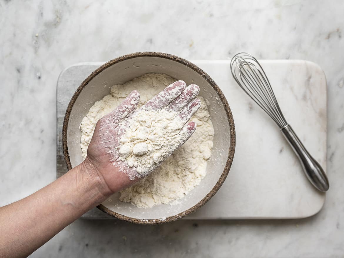 Mixing butter into flour mixture