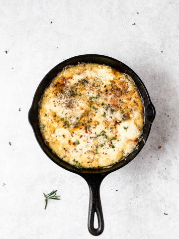 Baked Fontina with Herbs in skillet 