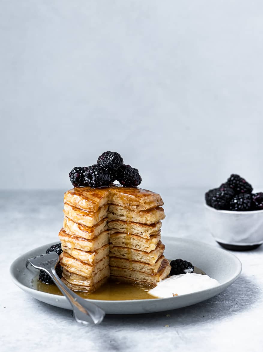 Fluffy Yogurt pancake stack with blackberries 