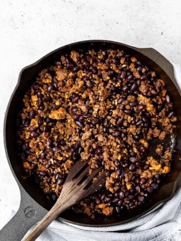 Chorizo, tempeh, and black bean mixture in skillet