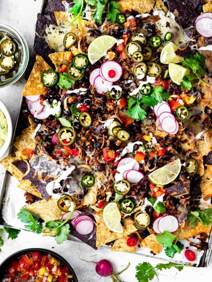 Chorizo and Black Bean Nachos with guacamole and pico de gallo