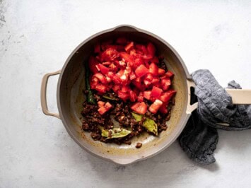 fresh tomatoes added to spices