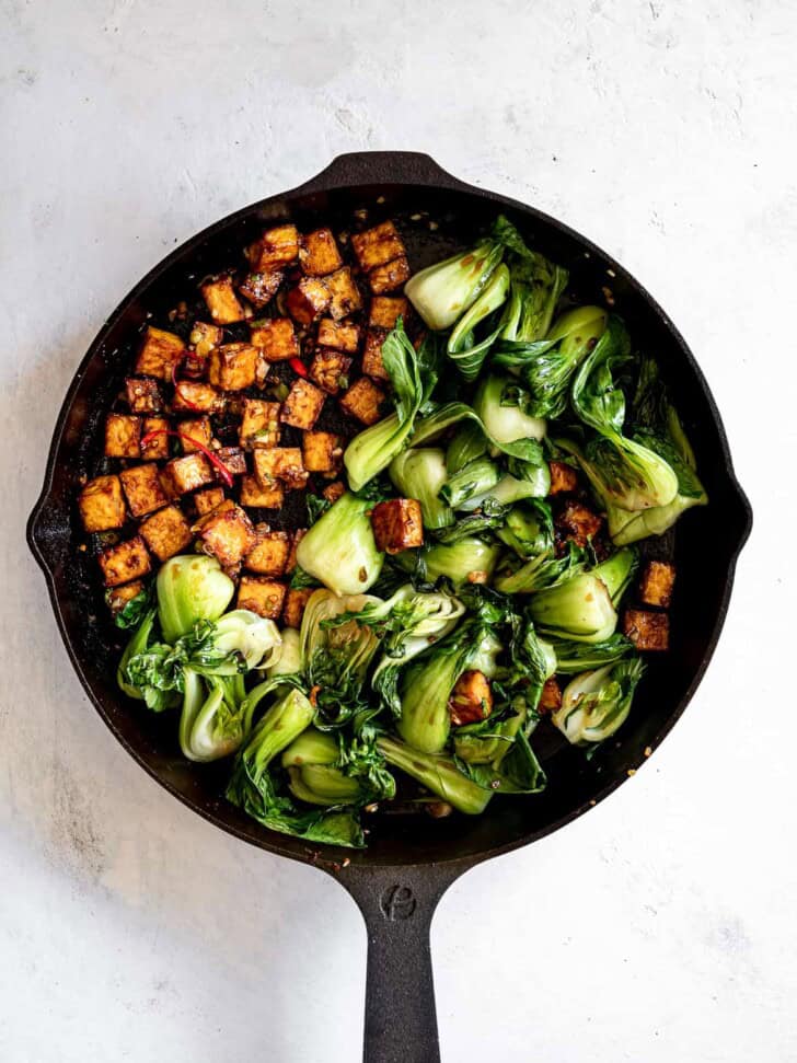 Tofu and Bok Choy stir fry in skillet