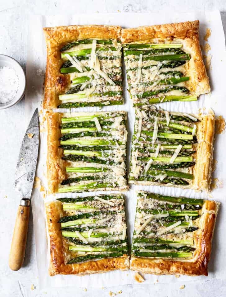 baked asparagus tart cut into 8 pieces