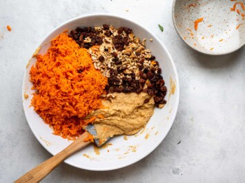 adding shredded carrots to batter