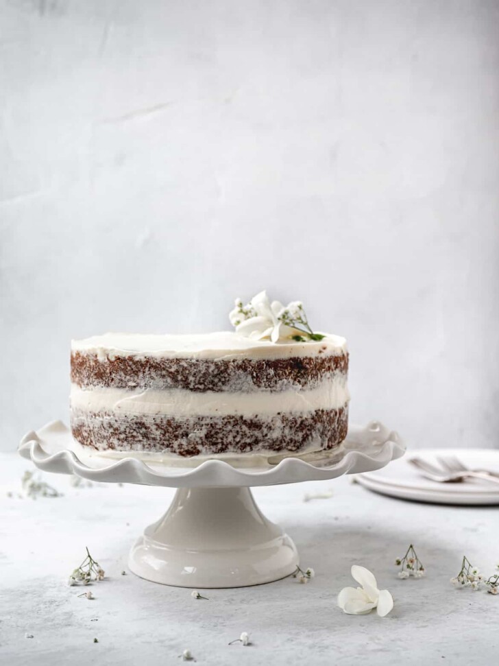 Side view of frosted grain-free carrot cake