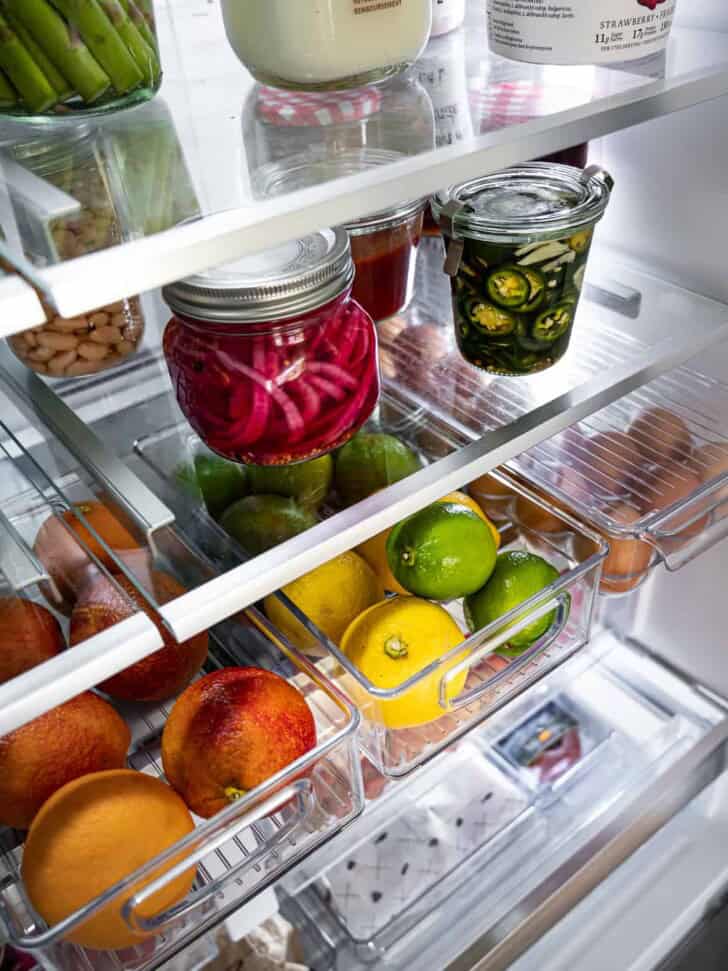 How to organize your fridge - close up of bins in fridge