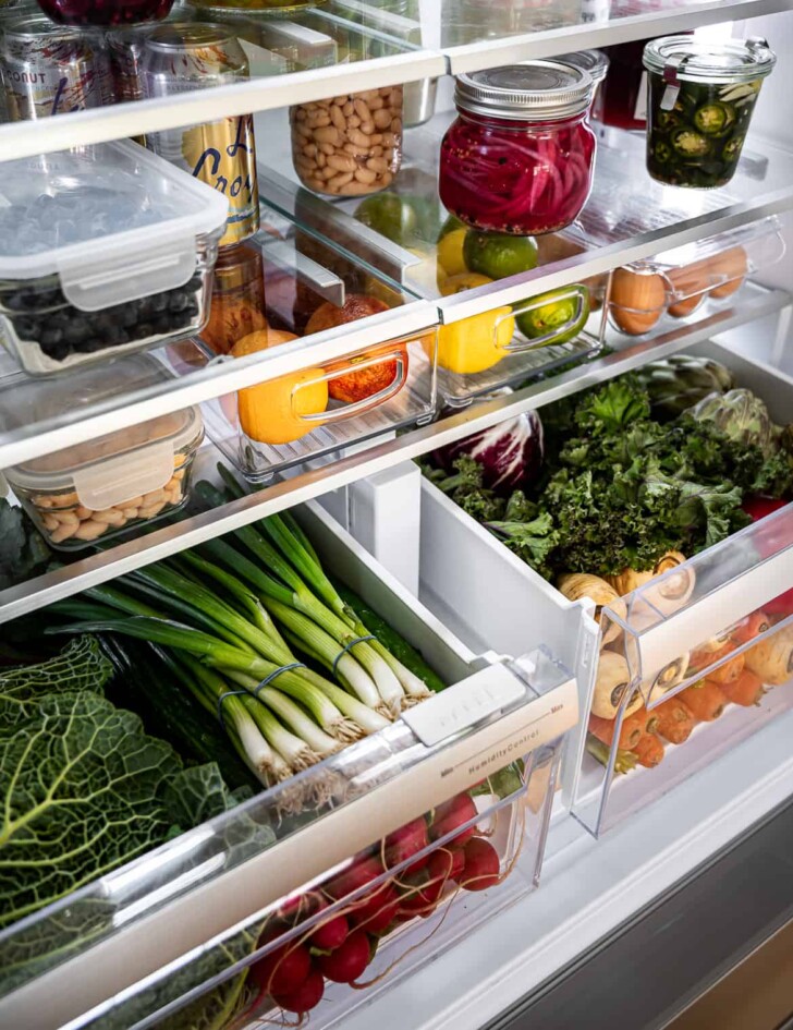 close up of crisper drawers with veggies