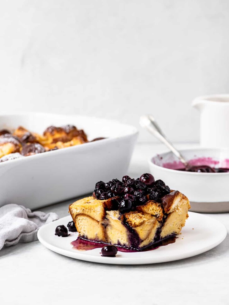 piece of baked French toast topped with blueberry compote