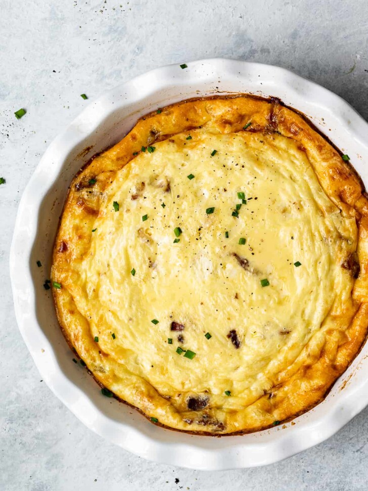 Crustless quiche with bacon in pie dish
