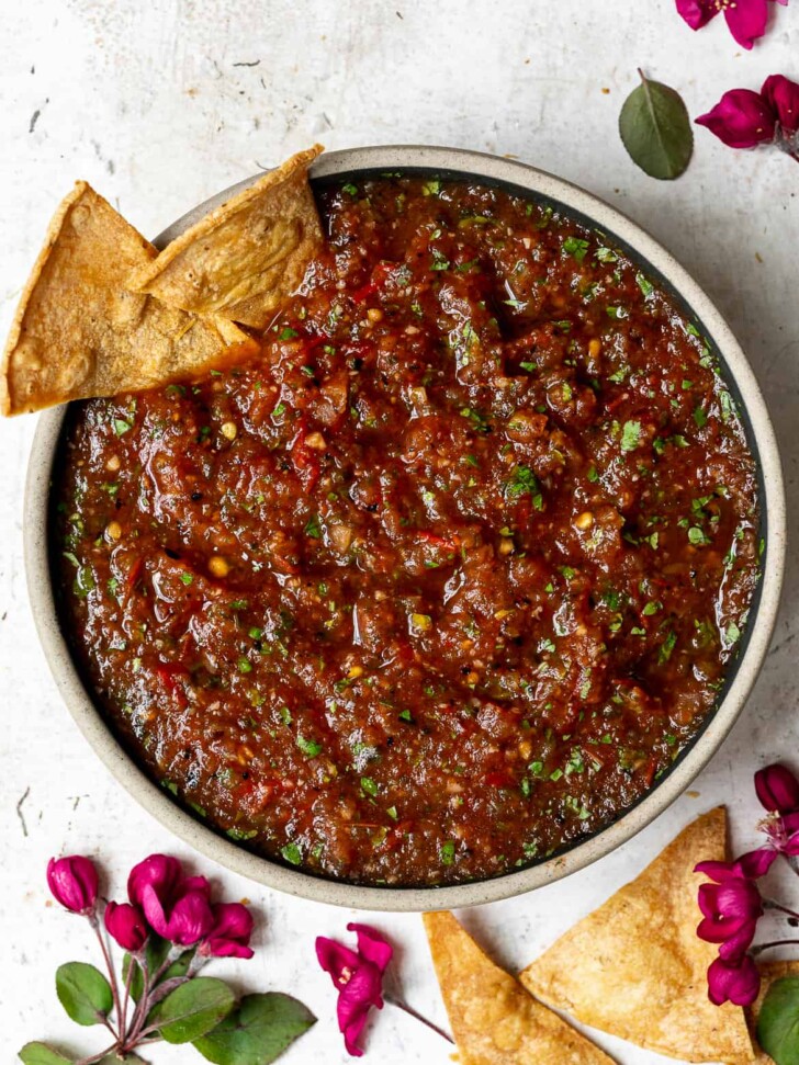 Charred Tomato Salsa in bowl with tortilla chips