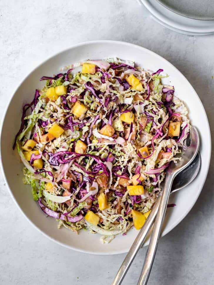 Pineapple coleslaw with yogurt dressing in bowl 