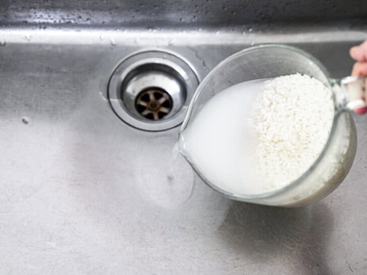 pouring out starchy water 