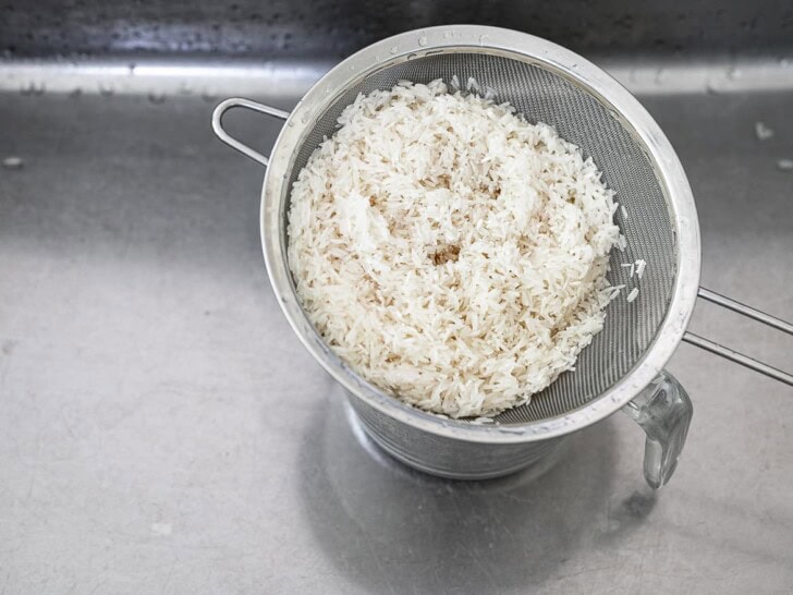 draining rice in strainer