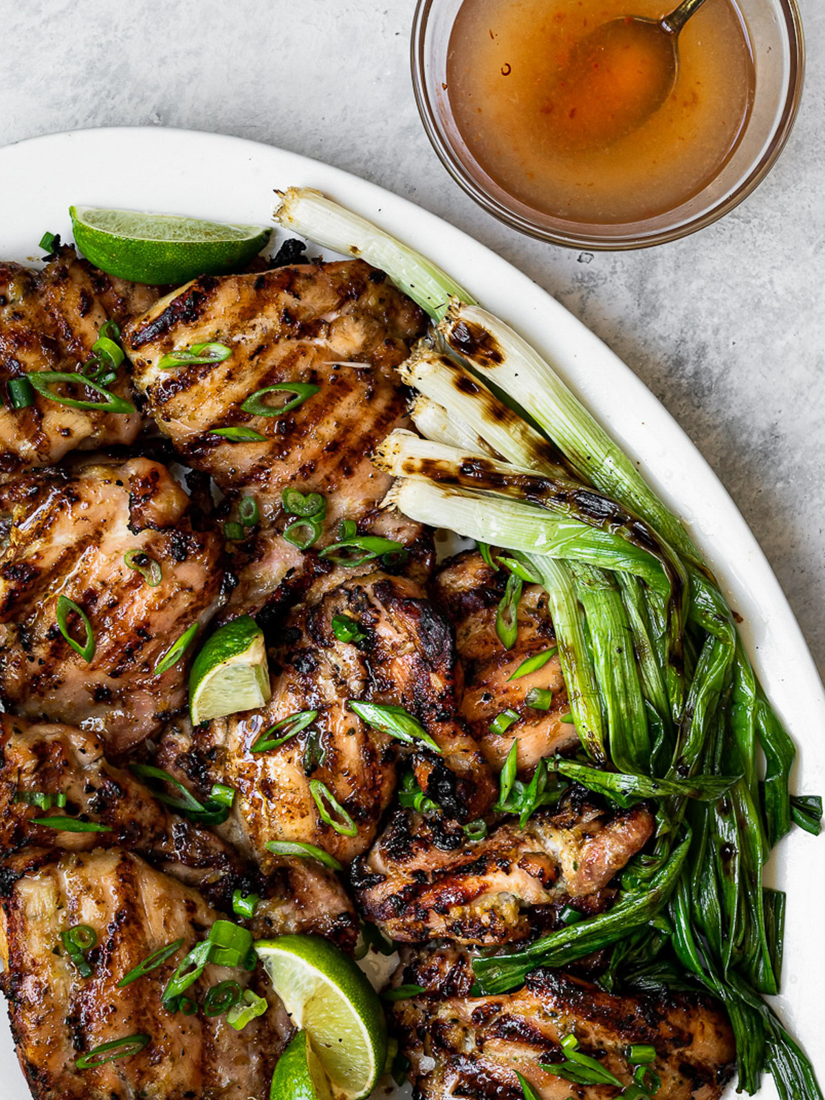 Grilled Lemongrass Chicken on platter with Nuoc Cham