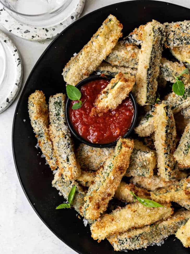 dipping zucchini fry in sauce