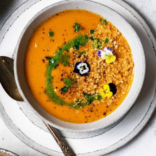 Creamy Zucchini Tomato Soup in bowls with quinoa