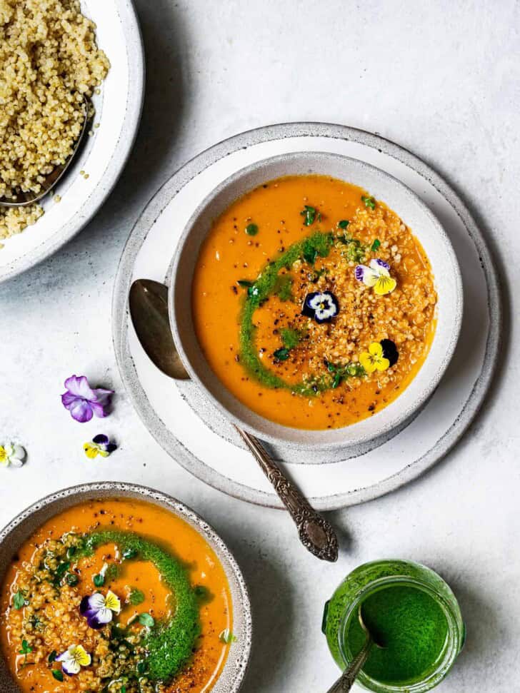 Creamy Zucchini Tomato Soup in bowls with quinoa 