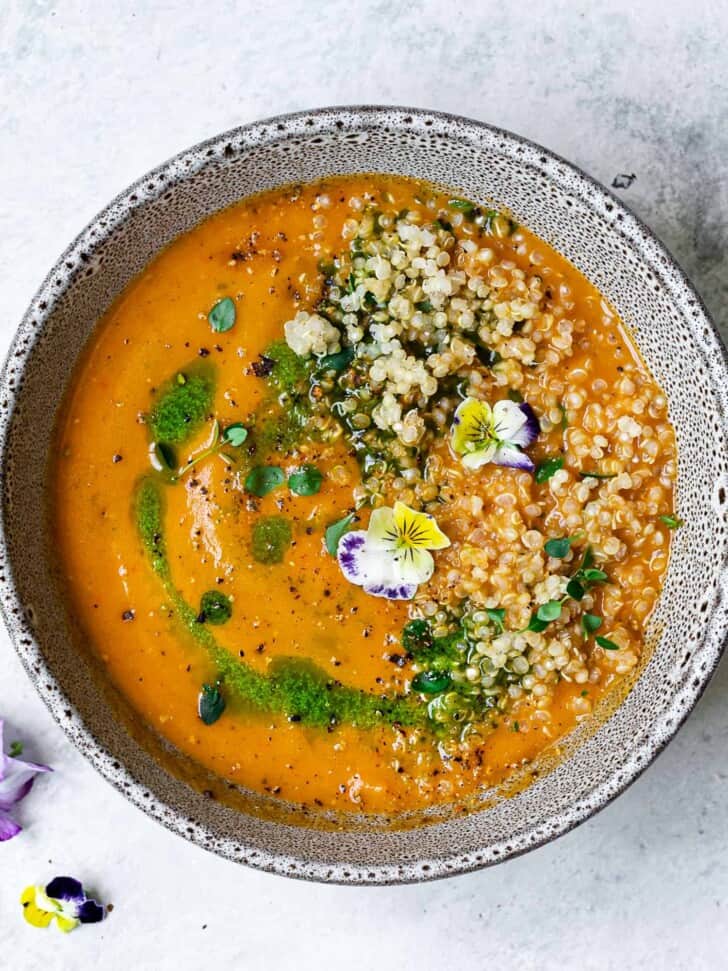 Creamy Zucchini Tomato Soup served in one bowl with quinoa 