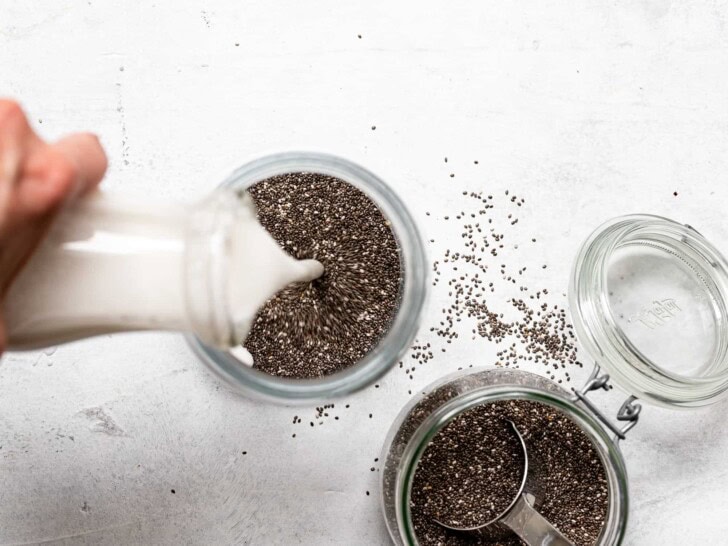 pouring milk over chia seeds