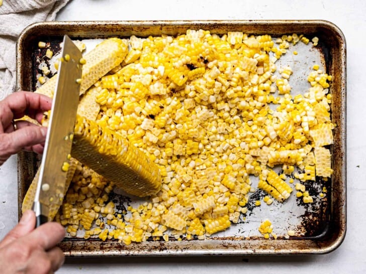 Slicing kernels off the cob with a knife