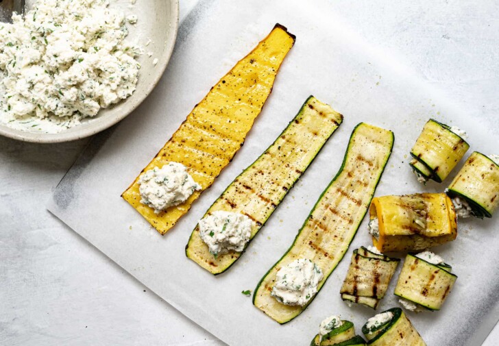 filling zucchini slices with ricotta mixture