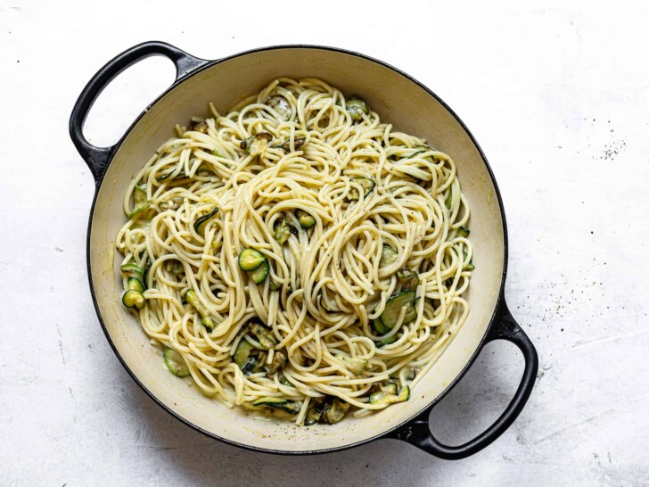 tossed spaghetti and zucchini in pan
