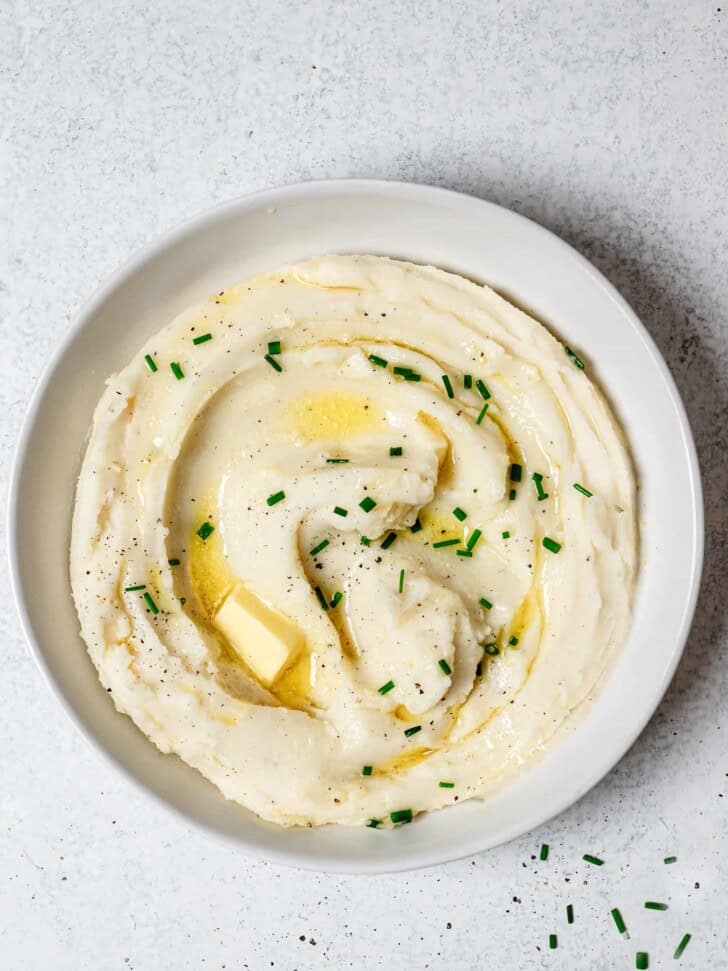 Instant Pot Mashed Potatoes in bowl garnished with chives 