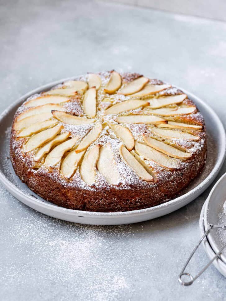 Side view of Baked Italian Apple Olive Oil Cake on plate