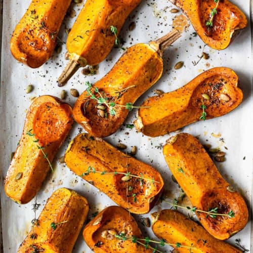 roasted honeynut squash with brown butter on baking sheet