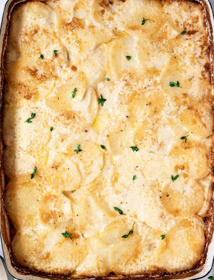 Close-up of baked Potatoes au gratin with caramelized onions