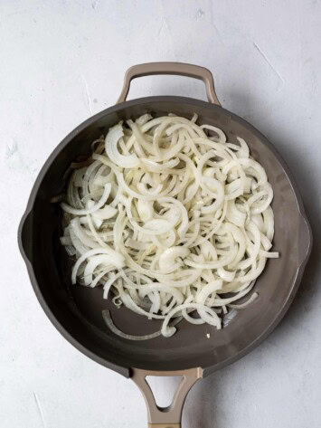 sliced onions in skillet