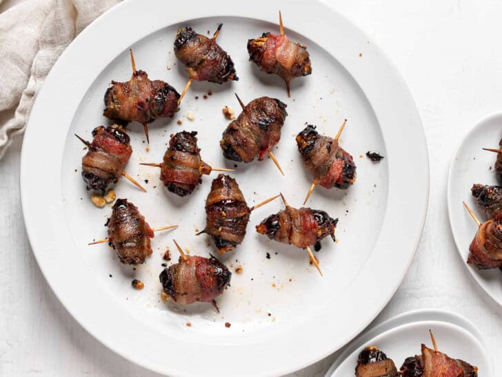 Baked Bacon wrapped dates on plate 