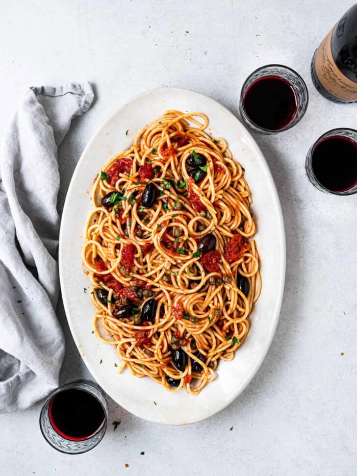 Pasta Puttanesca served on platter