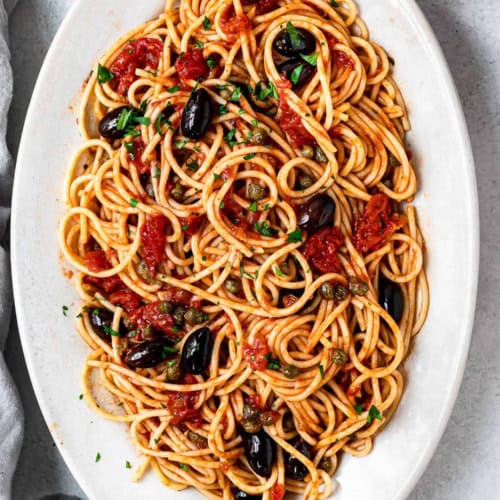 Pasta Puttanesca served on platter