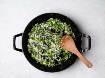 sautéing vegetables in pan