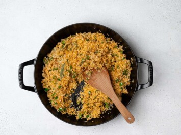 sautéing rice with onion mixture 