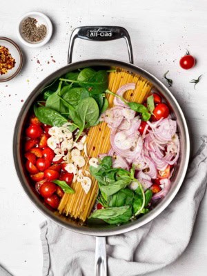 One pan pasta ingredients arranged in the pan