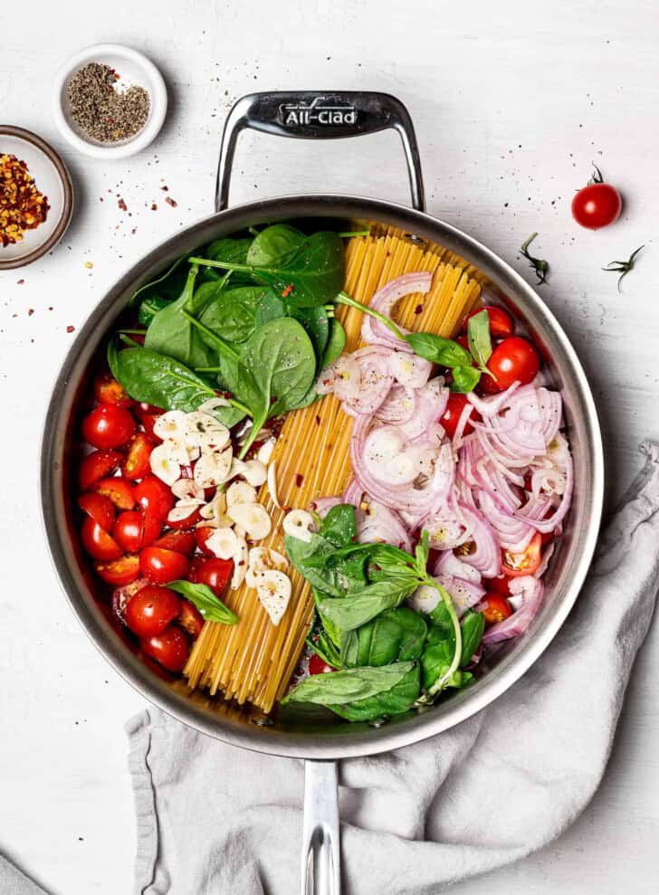 One pan pasta ingredients arranged in the pan