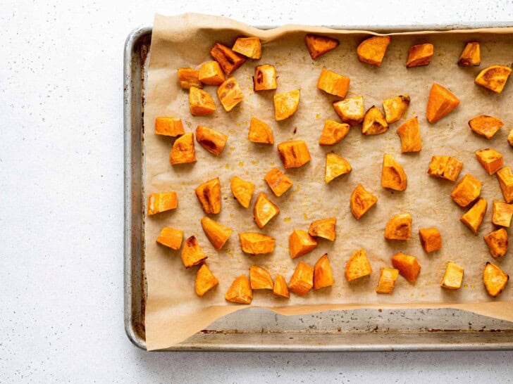 roasted sweet potato chunks on sheet pan 