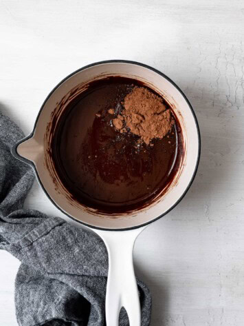 melted chocolate in pot with cocoa powder