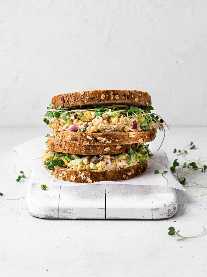 side view of two stacked chickpea salad sandwich 
