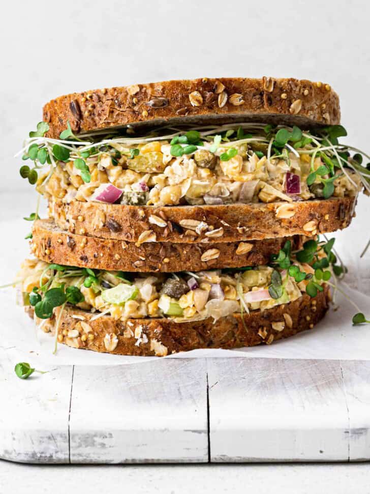 side view of two stacked chickpea salad sandwich 