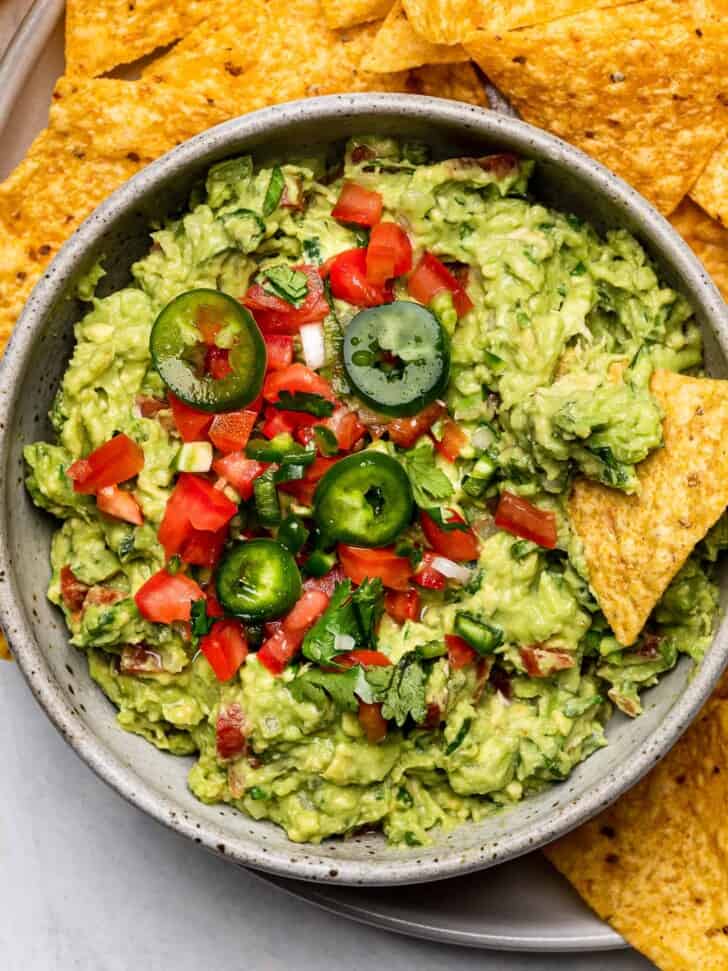 The best guacamole served in a bowl with tortilla chips